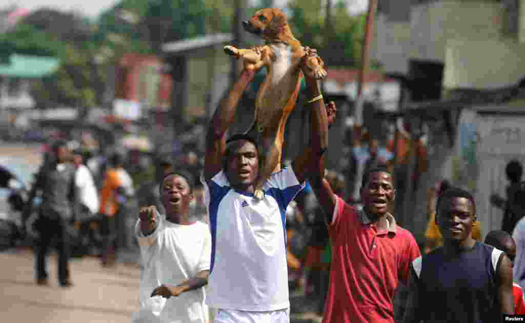 Des militants de l'opposition manifestent contre le président Joseph Kabila, à Kinshasa, en RDC, le 19 décembre 2016.