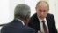 Russian President Vladimir Putin (R) listens to Kofi Annan, the UN and Arab League envoy for the Syrian crisis, during a meeting in the Kremlin, Moscow, July 17, 2012.