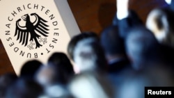 FILE - The logo of the German Federal Intelligence Agency (BND) is pictured at the 60th anniversary of the founding of the BND in Berlin, Nov. 28, 2016.