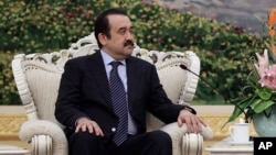 FILE - Kazakhstan's newly reappointed prime minister, Karim Masimov, is seen in a March 31, 2012, photo.