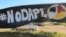 A banner protesting the Dakota Access oil pipeline is displayed at an encampment near North Dakota's Standing Rock Sioux reservation, Sept. 9, 2016. 