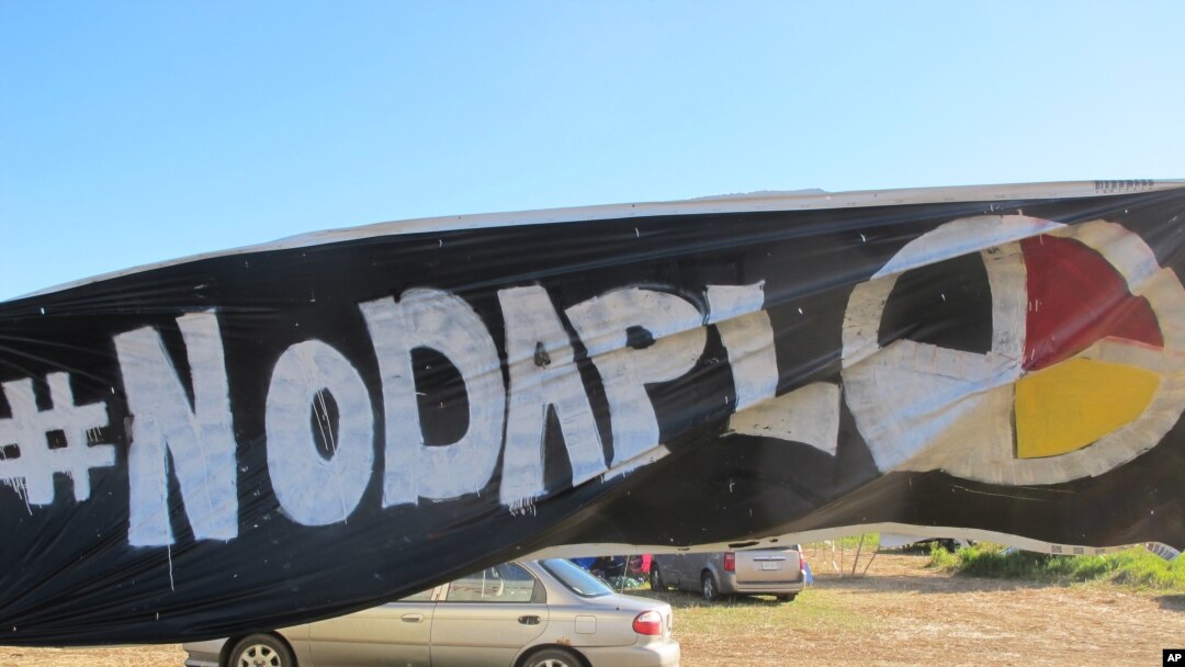 A banner protesting the Dakota Access oil pipeline near North Dakota's Standing Rock Sioux reservation.
