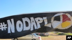 A banner protesting the Dakota Access oil pipeline near North Dakota's Standing Rock Sioux reservation.