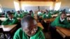 FILE - Girls attending school at Mtitu Secondary School where they live and study during school terms at Kilolo district, approximately 500 kilometers from the Tanzanian capital, Dar-es-Salaam, Sept. 1, 2008. 