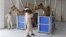 An employee feeds a camel a carrot at the Camelicious milk farm in Dubai, United Arab Emirates. Scientists have found a clue that suggests camels may be involved in infecting people in the Middle East with the MERS virus, July 3, 2013.