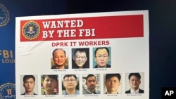 资料照片：美国圣路易斯联邦调查局宣布起诉14名朝鲜国民，他们参与了一项计划，利用IT人员使用虚假身份在美国公司获得远程工作，然后将他们的工资和其他资金输送回朝鲜，用于武器计划。（2024年12月12日）