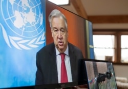 FILE - In this handout photo released by the United Nations, U.N. Secretary-General Antonio Guterres holds a virtual press conference at U.N. headquarters in New York City, April 3, 2020.