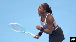 Coco Gauff of the US celebrates after defeating Paula Badosa of Spain in a women's singles semifinal match for the China Open tennis tournament at the National Tennis Center in Beijing, Oct. 5, 2024.