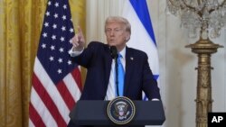 President Donald Trump and Israeli Prime Minister Benjamin Netanyahu take questions during a news conference in the East Room of the White House, Tuesday, Feb. 4, 2025, in Washington.