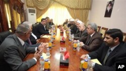 Representatives of Shi'ite cleric Muqtada al-Sadr and Iraqi Prime Minister Nouri al-Maliki's political parties meet in Baghdad, 01 Oct 2010