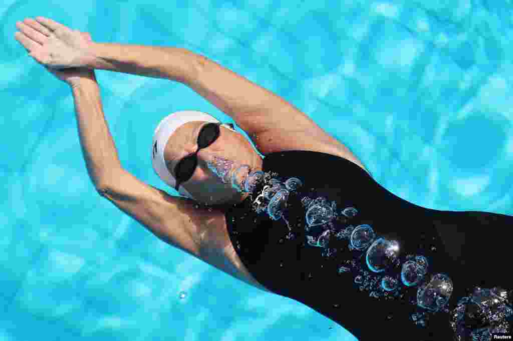 Egyptian swimmer Nagwa Ghorab, 76, swims underwater during her training session in Cairo, January 27, 2018.