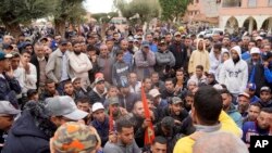 FILE - People displaced by the earthquake protest against lack of emergency assistance and worsening housing condition, in Amizmiz, outside Marrakech, Morocco, Tuesday, Oct. 24, 2023.