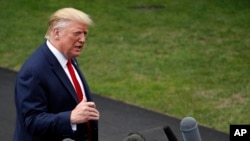 President Donald Trump speaks with reporters before departing on Marine One from the South Lawn of the White House, Sept. 9, 2019, in Washington. 