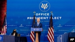 President-elect Joe Biden departs a news conference after introducing his nominees and appointees to economic policy posts at The Queen theater, December 1, 2020, in Wilmington, Delaware. 