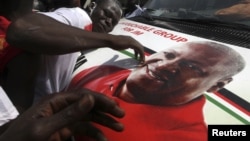 National Democratic Congress (NDC) party supporters celebrate the victory of their candidate, John Dramani Mahama, in Accra, December 9, 2012.