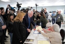 Democratic presidential candidate Sen. Bernie Sanders, I-Vt., arrives to vote in the Vermont Primary near his home in Burlington, Vt., March 3, 2020.