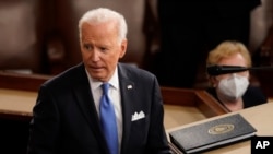 President Joe Biden turns from the podium after speaking to a joint session of Congress, April 28, 2021, in the House Chamber at the U.S. Capitol in Washington. 