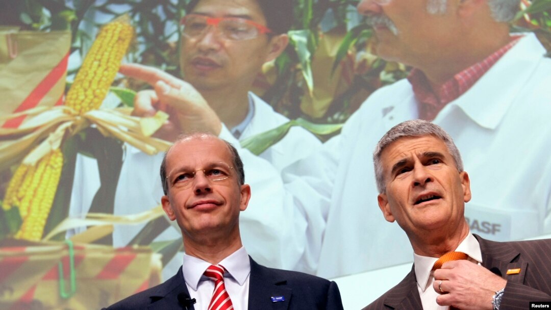 FILE - Juergen Hambrecht (R), CEO of German chemical company BASF, poses with CFO Kurt Bock during the annual news conference in Ludwigshafen, Germany.