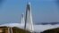 FILE - Yavuz Sultan Selim bridge covered by fog over the Bosphorus, Istanbul, April 27, 2017. 