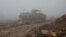 A Turkish military tank is seen near Mount Barsaya, northeast of Afrin, Syria, Jan. 23, 2018. 