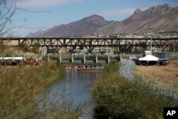 About 200 families whose members live on different sides of the U.S.-Mexico border saw one another during the annual "Hugs Not Walls" event in Ciudad Juarez, Mexico, Nov. 2, 2024. Participants reunited in the middle of the Rio Grande.