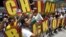 Filipinos chant anti-China slogans over the disputed Scarborough Shoal islands in the South China Sea claimed by both nations as they march toward the Chinese consulate in the Makati financial district of Manila, Philippines, May 11, 2012. 
