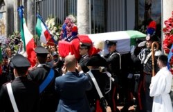 Carabinieri officers carry the coffin of slain Carabinieri military police officer Mario Cerciello Rega during his funeral in his hometown Somma Vesuviana, Italy, July 29, 2019.