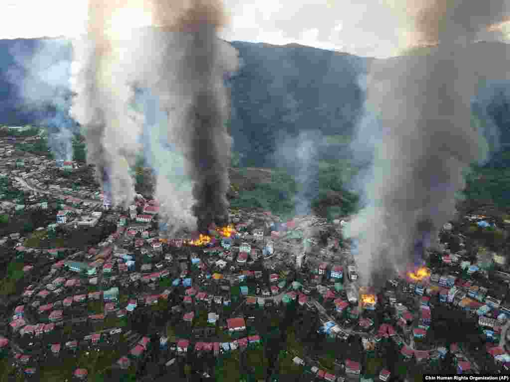 MyanmarFires burn in the town of Thantlang in Myanmar's northwestern state of Chin, Oct. 29, 2021. More than 160 buildings in the town in the northwestern Myanmar, including three churches, have been destroyed by fire caused by shelling by government troops, local media and activists reported.