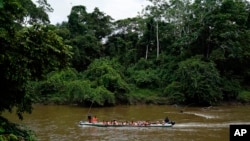 FILE - Migrants heading north arrive in Lajas Blancas, Darien province, Panama, on Oct. 6, 2023, after walking across the Darien Gap from Colombia. Doctors Without Borders reported on Nov. 17 that many women migrants have been sexually assaulted this year in the jungle stretch.