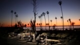 The devastation of the Palisades Fire is seen at sunset in the Pacific Palisades neighborhood of Los Angeles, Jan. 14, 2025. 