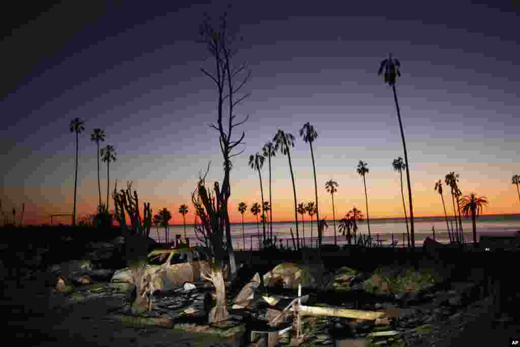 The devastation of the Palisades Fire is seen at sunset in the Pacific Palisades neighborhood of Los Angeles, California, Jan. 14, 2025.