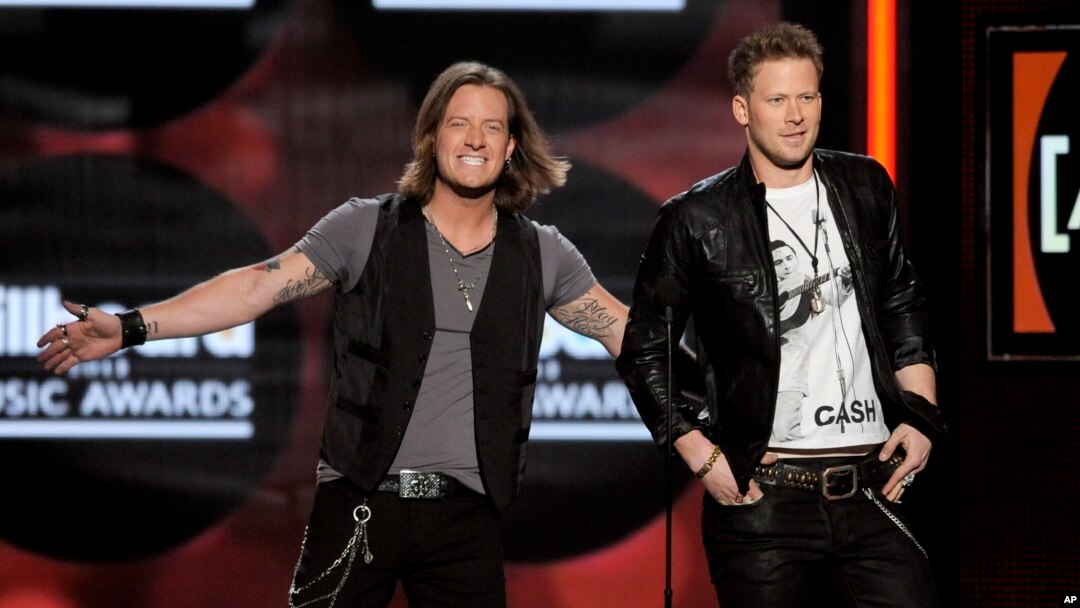 Tyler Hubbard, left, and Brian Kelley, of Florida Georgia Line, on stage at the Billboard Music Awards at the MGM Grand Garden Arena in Las Vegas, May 19, 2013. 
