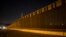 A portion of the new steel border fence stretches along the US-Mexico border in Sunland Park, New Mexico, March 30, 2017. This fencing just west of the New Mexico state line was planned and started before President Donald Trump's election.