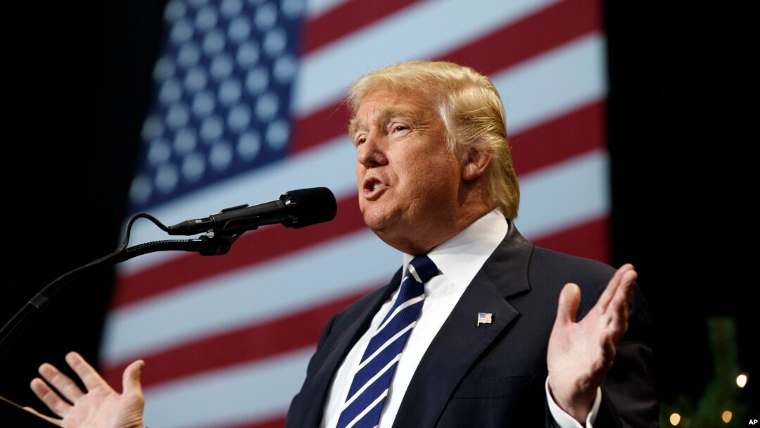 President-elect Donald Trump speaks during a rally at the Wisconsin State Fair Exposition Center in West Allis, Wisconsin, Dec. 13, 2016. In what is seen as a voting ritual, the Electoral College on Monday is expected to officially confirm Trump as the 45