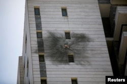 A view shows a damaged residential building, after projectiles attack towards Israel from Lebanon, amid cross-border hostilities between Hezbollah and Israeli forces, in Nahariya, northern Israel, Sept. 9, 2024.