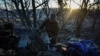 A Ukrainian serviceman uploads shells in a tank, amid Russia's attack on Ukraine, in Luhansk region, Ukraine, Feb. 18, 2024. 