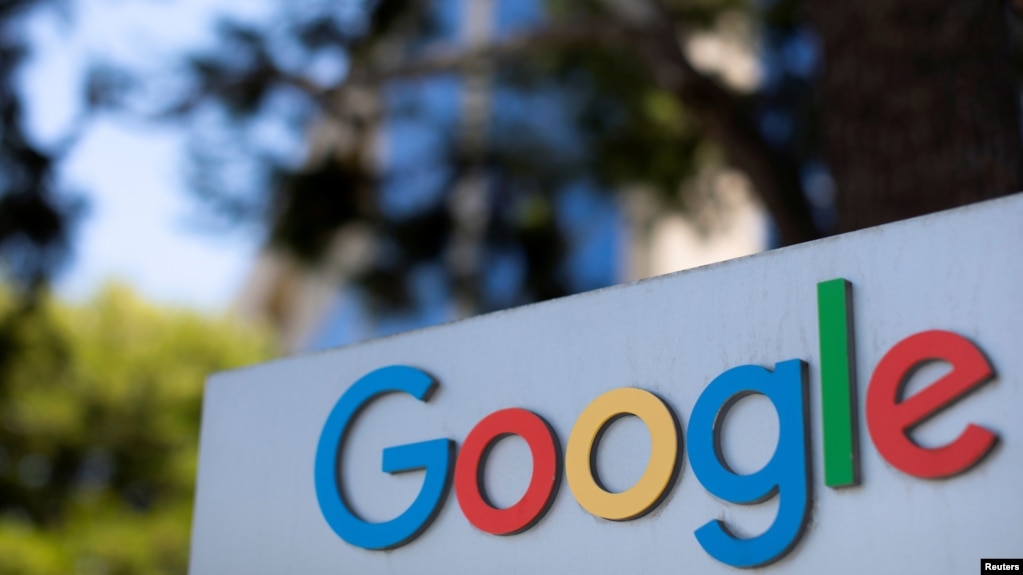 FILE - A Google sign is shown at one of the company's office complexes in Irvine, California.