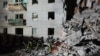 Rescuers work at the site of a residential building hit by a Russian air strike in the village of Svesa in Sumy region, Ukraine, Jan. 4, 2025. (Press service of the State Emergency Service of Ukraine in Sumy region/Handout via Reuters)