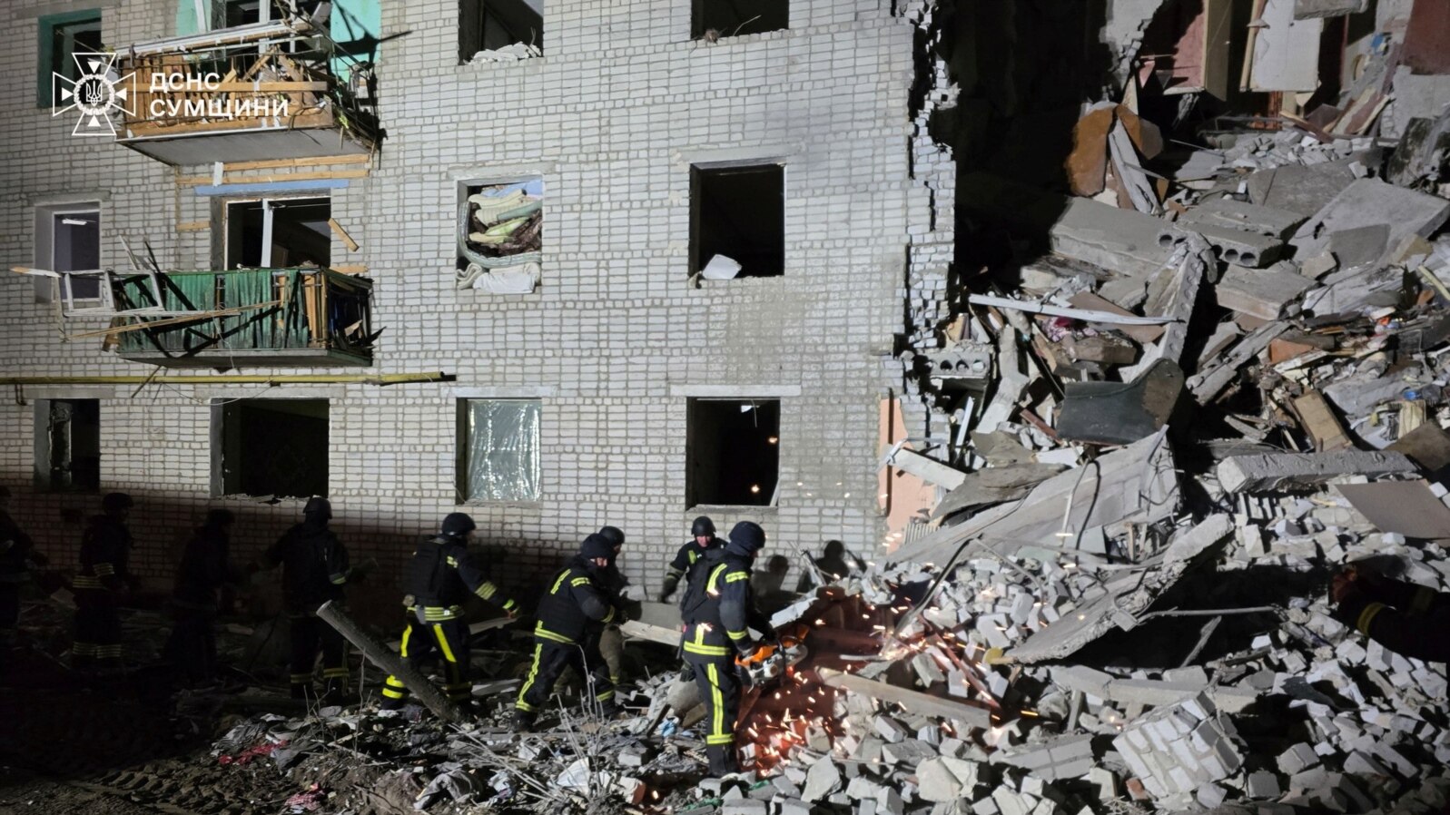 Rescuers work at the site of a residential building hit by a Russian air strike in the village of Svesa in Sumy region, Ukraine, Jan. 4, 2025. (Press service of the State Emergency Service of Ukraine in Sumy region/Handout via Reuters)