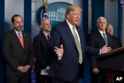 President Donald Trump speaks during a press briefing with the coronavirus task force, at the White House, Tuesday, March 17, 2020, in Washington.