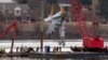 Crews return to the Potomac River to recover wreckage from DC midair collision  