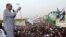 President Omar Hassan al-Bashir addresses a crowd in North Khartoum, June 8, 2013. 