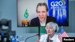 FILE — U.S. Treasury Secretary Janet Yellen attends a virtual meeting with Brazil's Finance Minister Fernando Haddad in Sao Paulo, Brazil, February 27, 2024.