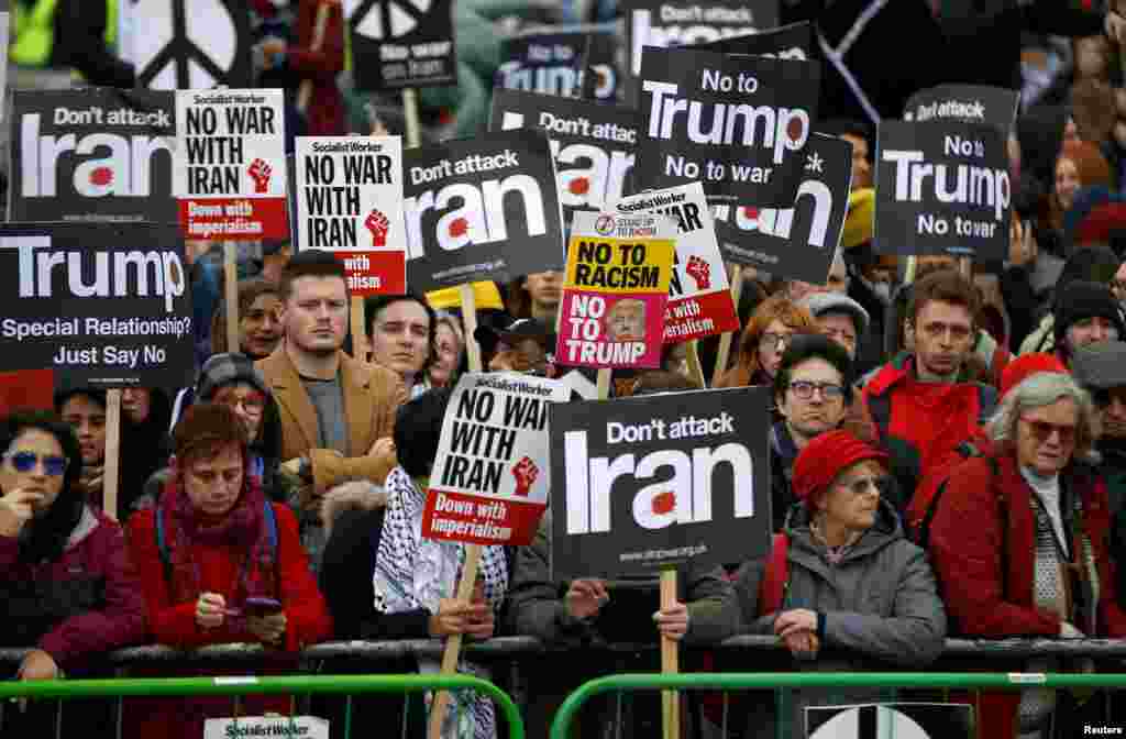 Demonstrators attend a protest to oppose the threat of war with Iran, in London, Jan. 11, 2020.