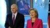 Secretary of State Hillary Clinton (R) walks with Greek Prime Minister George Papandreou before news conference in Washington, 8 Mar 2010