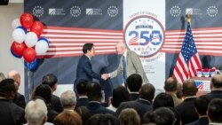 资料照片：美国在台协会台北办事处处长谷立言在庆祝美国建国250周年酒会上与台湾总统赖清德握手。(2026年5月27日)