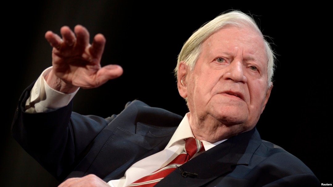 FILE - Former West German Chancellor Helmut Schmidt gestures during his speech at his 95th birthday party, organized by German weekly magazine "Die Zeit," in a theater in Hamburg, Jan. 19, 2014. Schmidt died Nov. 10, 2015. 