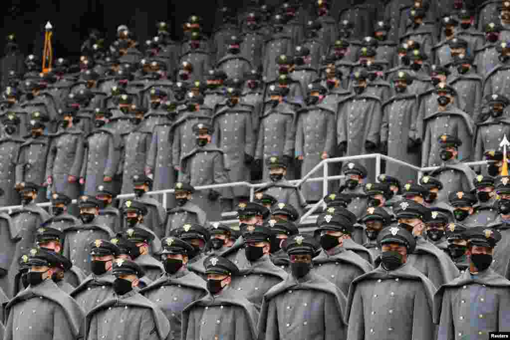 U.S. Army cadets wearing protective masks stand at Michie Stadium ahead of the annual Army-Navy collegiate football game, in West Point, New York, Dec. 12, 2020.