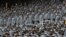 U.S. Army cadets wearing protective masks stand at Michie Stadium ahead of the annual Army-Navy collegiate football game, in West Point, New York, U.S., December 12, 2020.