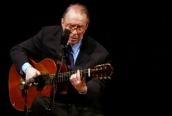 FILE - Brazilian composer Joao Gilberto performs at Carnegie Hall, in New York, June 18, 2004.